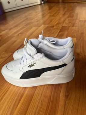 Puma White Low-Top Sneakers with Black Formstrip and Gold Logo